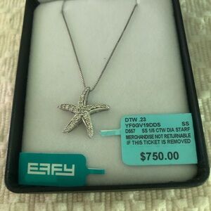 Effy brand sterling silver and diamond STARFISH pendant.